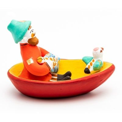 Мужик в лодке с рыбой и птичкой4