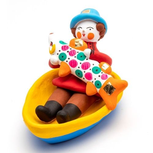 Фигурка "Мужик в лодке с рыбой"