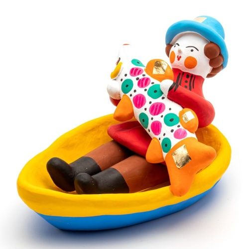 Фигурка "Мужик в лодке с рыбой"